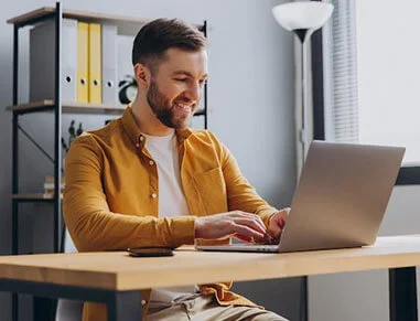 Guy On Computer Using Track Rocket